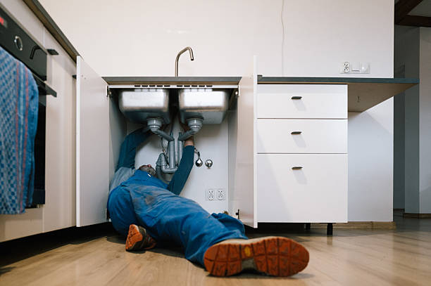 Professional Emergency Plumber technician working in Buzzards Bay, MA